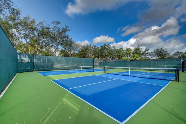 2737 Clipper Cir, West Palm Beach, FL 33411 - view of tennis court featuring community basketball court