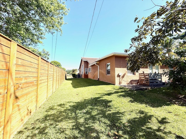 434 SE Doat St, Port Saint Lucie, FL 34983 - view of yard featuring a fenced backyard