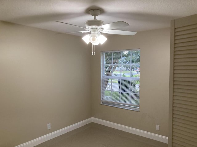 1112 Wild Cherry Ln, Wellington, FL 33414 - spare room with baseboards and ceiling fan