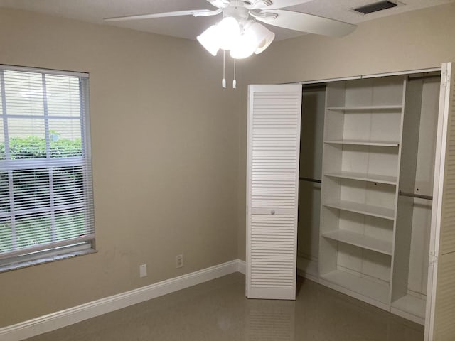 1112 Wild Cherry Ln, Wellington, FL 33414 - unfurnished bedroom with visible vents, baseboards, a closet, and ceiling fan
