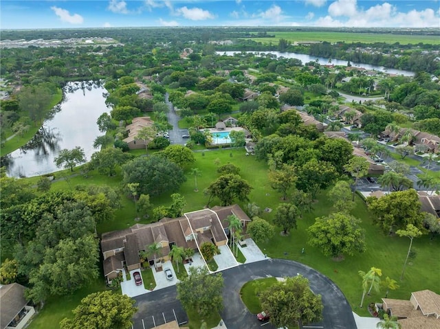 drone / aerial view with a water view