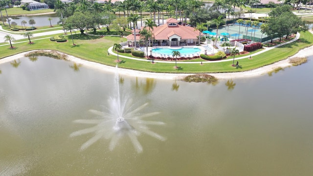 aerial view of a pool and a large body of water