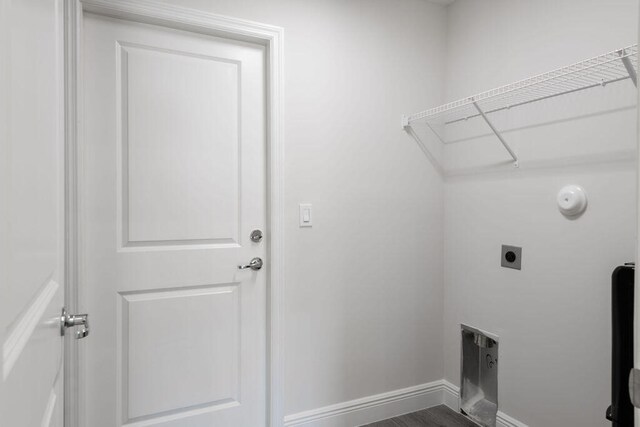 2372 SW Import Dr, Port Saint Lucie, FL 34953 - washroom featuring laundry area, hookup for an electric dryer, and baseboards
