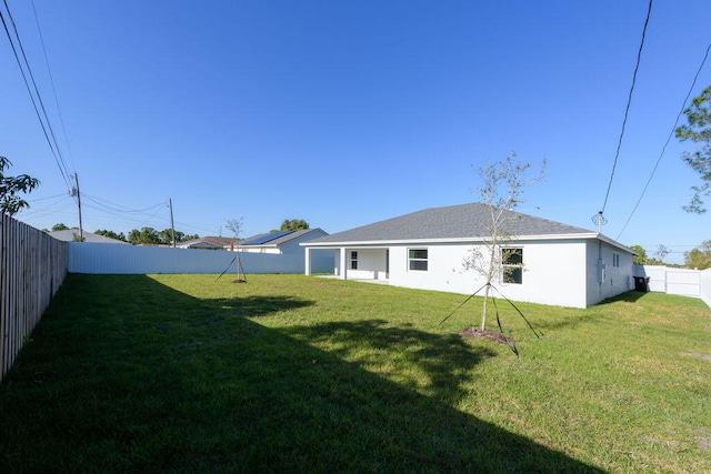 2372 SW Import Dr, Port Saint Lucie, FL 34953 - view of yard featuring a fenced backyard