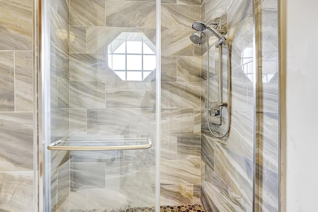 bathroom featuring a shower stall