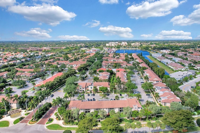 bird's eye view with a residential view and a water view
