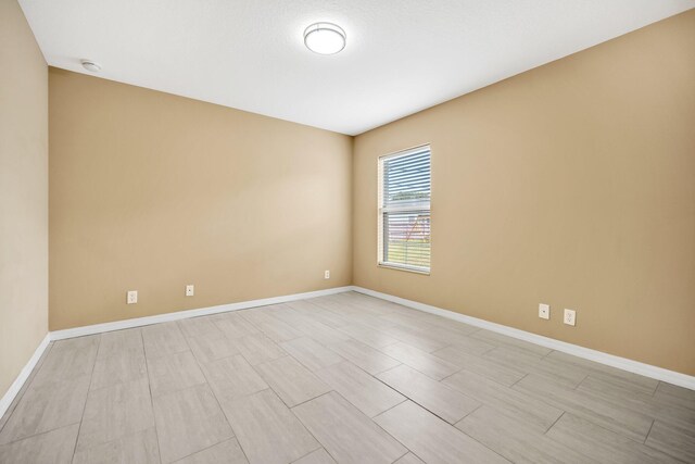 1355 SW Porter Rd, Port Saint Lucie, FL 34953 - spare room with baseboards