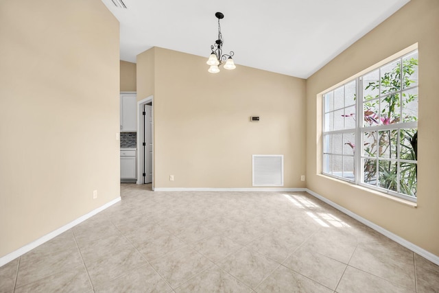 1355 SW Porter Rd, Port Saint Lucie, FL 34953 - empty room with baseboards, light tile patterned flooring, visible vents, and a notable chandelier