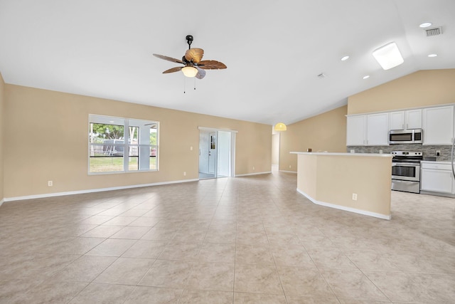 1355 SW Porter Rd, Port Saint Lucie, FL 34953 - unfurnished living room featuring a ceiling fan, lofted ceiling, light tile patterned floors, baseboards, and visible vents
