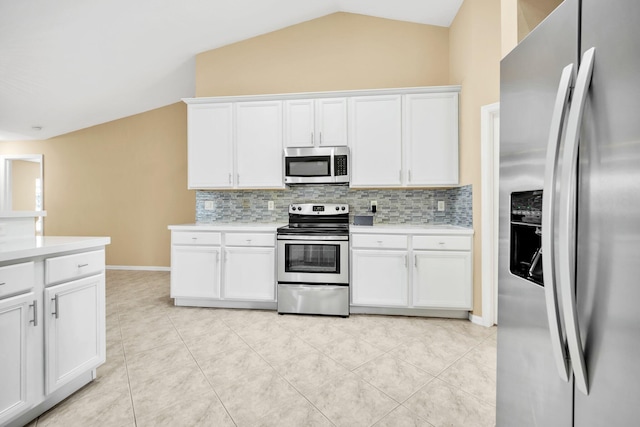 1355 SW Porter Rd, Port Saint Lucie, FL 34953 - kitchen with backsplash, light countertops, appliances with stainless steel finishes, and white cabinets