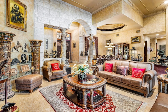 16090 Rio Del Paz, Delray Beach, FL 33446 - living area featuring ornate columns, crown molding, a chandelier, and arched walkways