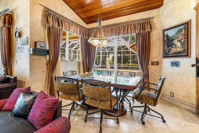 16090 Rio Del Paz, Delray Beach, FL 33446 - dining room with wooden ceiling, vaulted ceiling, a textured wall, and baseboards