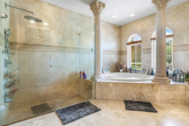 16090 Rio Del Paz, Delray Beach, FL 33446 - full bathroom featuring decorative columns, a garden tub, a tile shower, and tile patterned floors