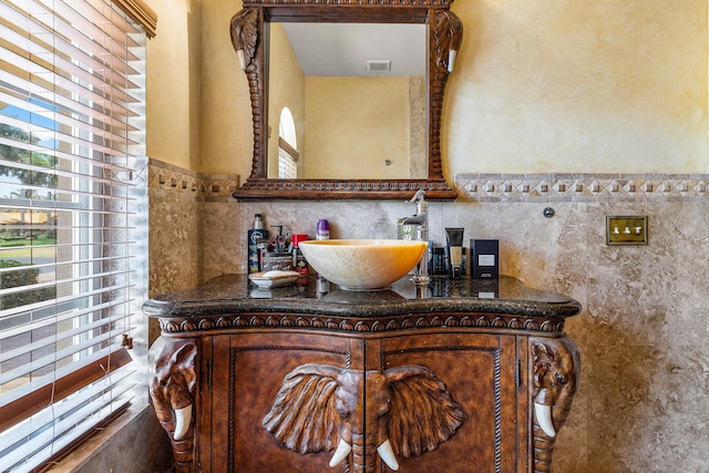 16090 Rio Del Paz, Delray Beach, FL 33446 - bathroom with healthy amount of natural light, tile walls, and vanity