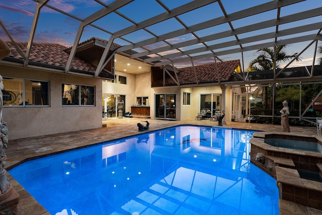 16090 Rio Del Paz, Delray Beach, FL 33446 - view of pool with a patio, glass enclosure, and a pool with connected hot tub