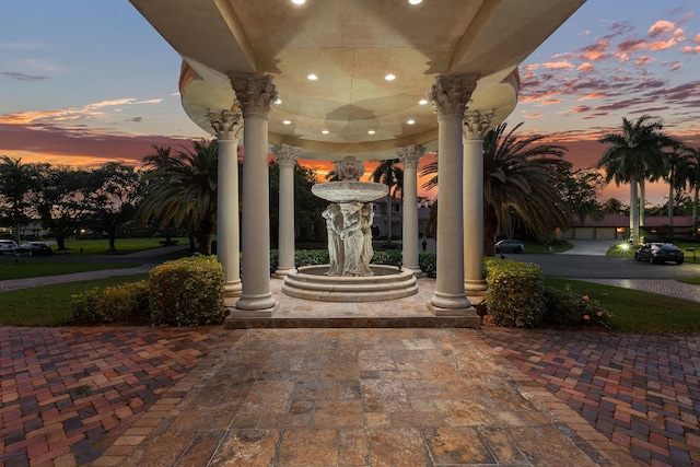 16090 Rio Del Paz, Delray Beach, FL 33446 - exterior entry at dusk featuring decorative driveway