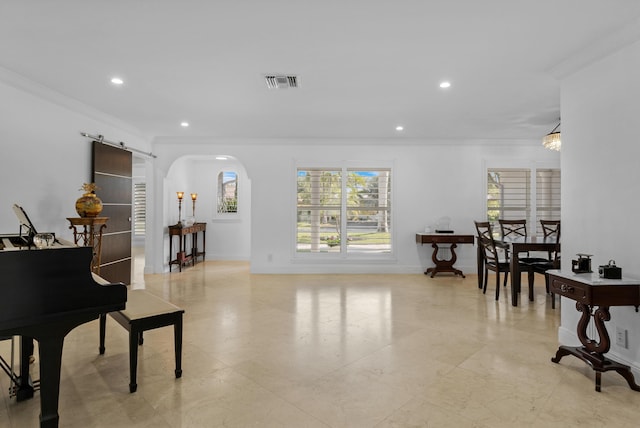 6611 NE 21st Ln, Fort Lauderdale, FL 33308 - living area featuring arched walkways, baseboards, visible vents, and crown molding