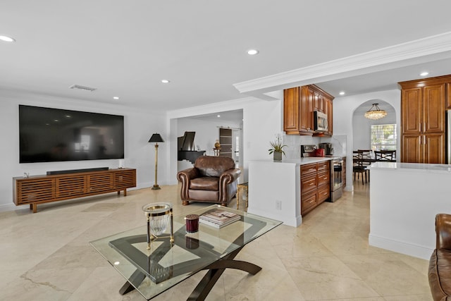 6611 NE 21st Ln, Fort Lauderdale, FL 33308 - living room with ornamental molding and recessed lighting