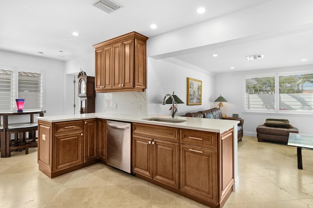 6611 NE 21st Ln, Fort Lauderdale, FL 33308 - kitchen with a sink, light countertops, dishwasher, and a peninsula