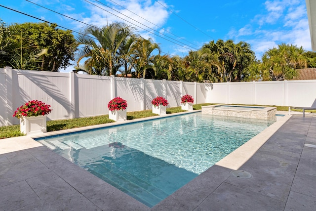 6611 NE 21st Ln, Fort Lauderdale, FL 33308 - view of pool featuring a patio, a fenced backyard, and a pool with connected hot tub