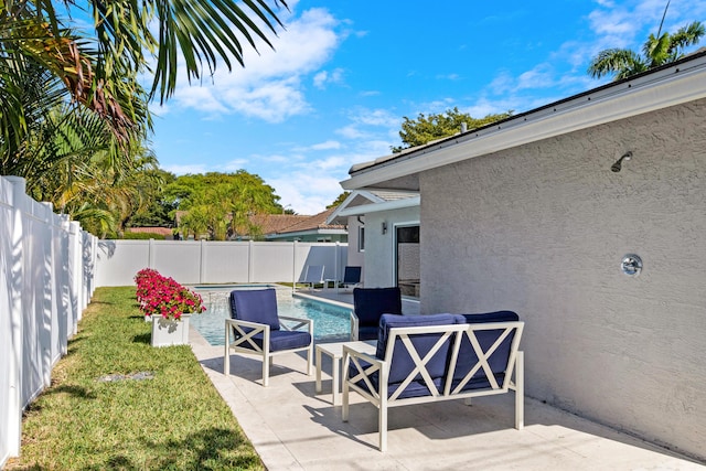 6611 NE 21st Ln, Fort Lauderdale, FL 33308 - view of patio featuring a fenced backyard and a fenced in pool