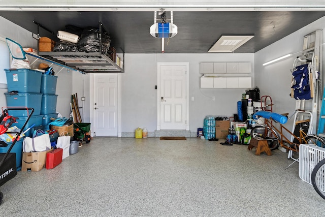 6611 NE 21st Ln, Fort Lauderdale, FL 33308 - garage featuring a garage door opener