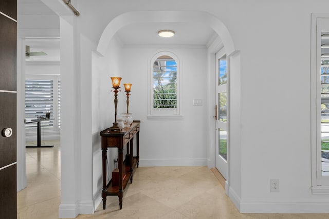 6611 NE 21st Ln, Fort Lauderdale, FL 33308 - entryway with baseboards and arched walkways