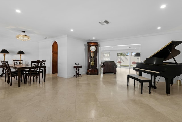 6611 NE 21st Ln, Fort Lauderdale, FL 33308 - dining area featuring crown molding, baseboards, visible vents, arched walkways, and recessed lighting