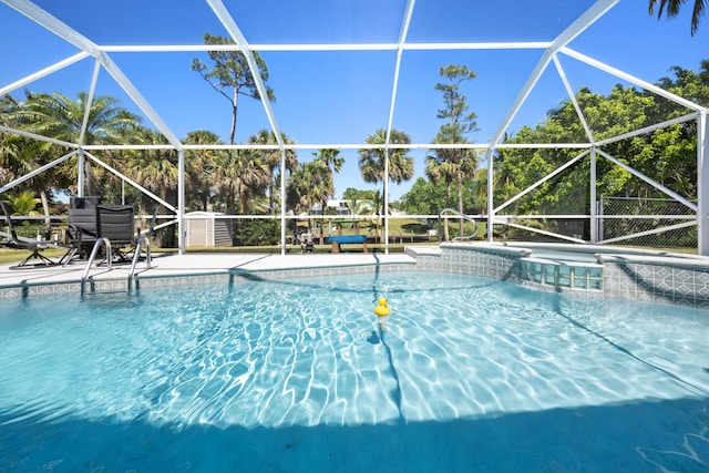 131 NE Naranja Ave, Port Saint Lucie, FL 34983 - outdoor pool featuring a patio area, a jacuzzi, and a lanai