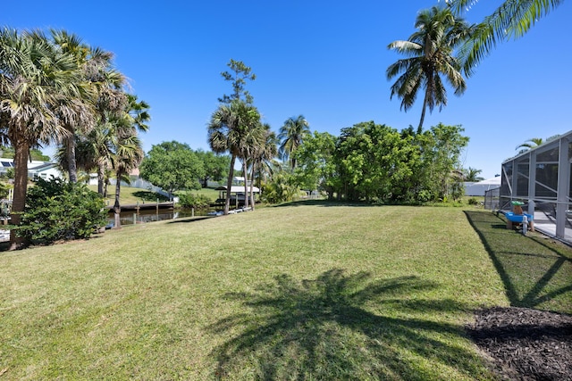 131 NE Naranja Ave, Port Saint Lucie, FL 34983 - view of yard with a lanai
