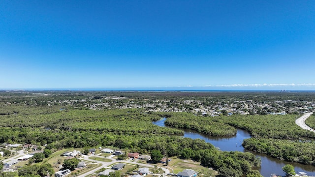 131 NE Naranja Ave, Port Saint Lucie, FL 34983 - birds eye view of property with a water view and a view of trees