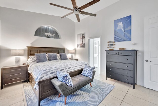 bedroom with light tile patterned flooring and a ceiling fan