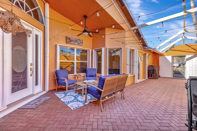 view of patio with a ceiling fan