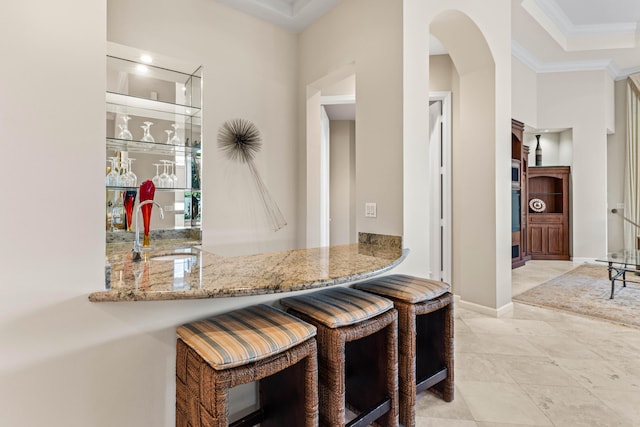 16137 Via Monteverde, Delray Beach, FL 33446 - interior space with baseboards, crown molding, arched walkways, and a sink
