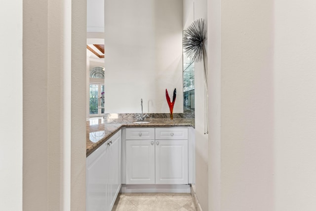 16137 Via Monteverde, Delray Beach, FL 33446 - bar with indoor wet bar, a sink, and light tile patterned floors
