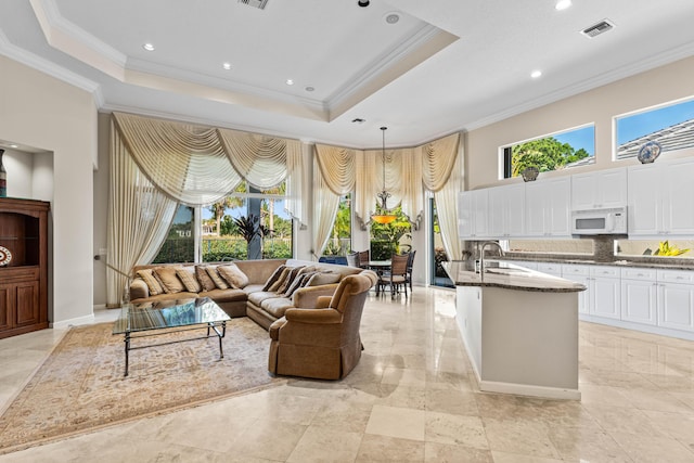 16137 Via Monteverde, Delray Beach, FL 33446 - living area with a raised ceiling, crown molding, and visible vents