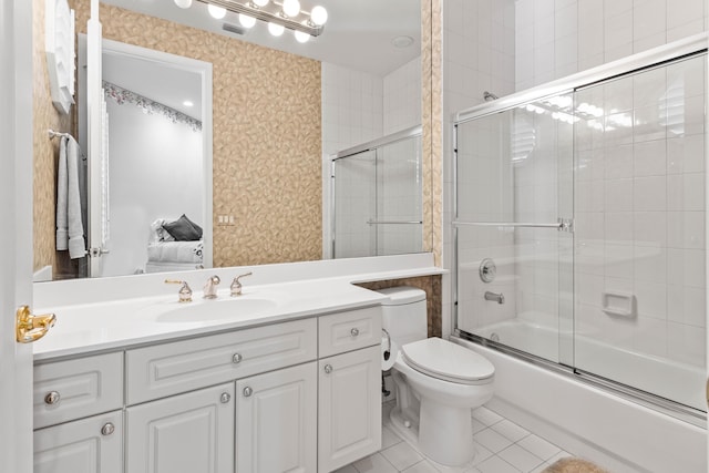 16137 Via Monteverde, Delray Beach, FL 33446 - bathroom with vanity, shower / bath combination with glass door, toilet, tile patterned floors, and visible vents