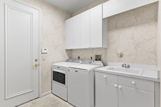 16137 Via Monteverde, Delray Beach, FL 33446 - washroom with washing machine and clothes dryer, cabinet space, a sink, and light tile patterned floors