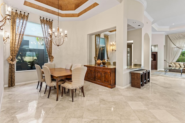 16137 Via Monteverde, Delray Beach, FL 33446 - dining area with a raised ceiling, a notable chandelier, and baseboards