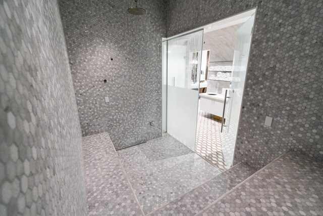 16137 Via Monteverde, Delray Beach, FL 33446 - full bath with tile patterned floors, a walk in shower, and vanity