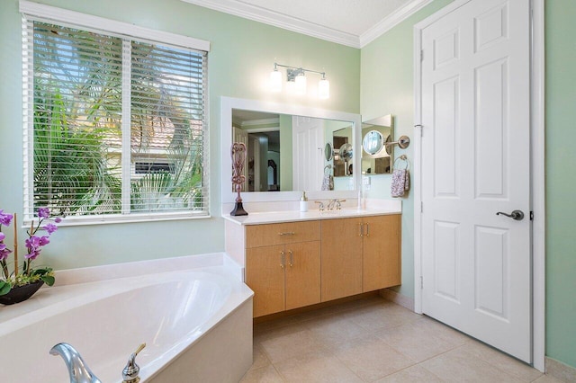 full bathroom with a garden tub, crown molding, vanity, and tile patterned floors