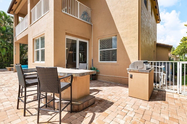 view of patio featuring outdoor dry bar