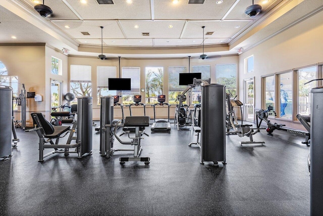 gym with coffered ceiling, crown molding, and recessed lighting