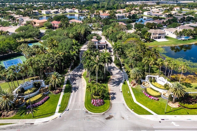 bird's eye view featuring a residential view and a water view