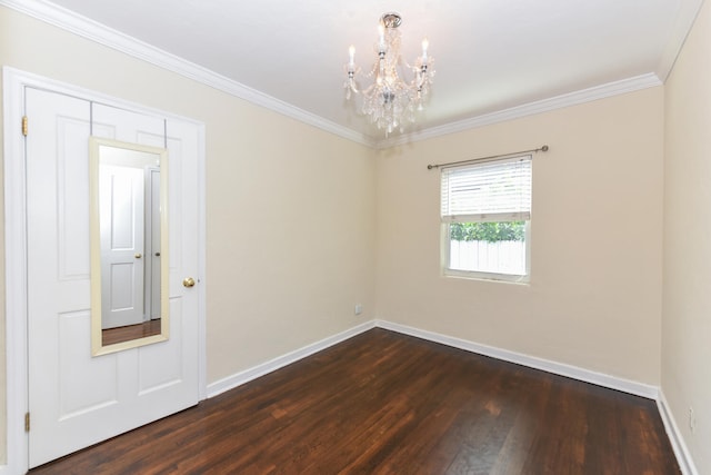 340 Russlyn Dr, West Palm Beach, FL 33405 - spare room featuring a chandelier, dark wood-type flooring, baseboards, and crown molding