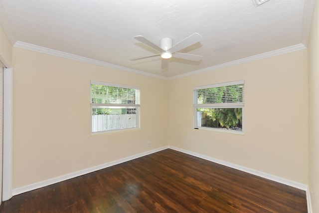 340 Russlyn Dr, West Palm Beach, FL 33405 - empty room featuring dark wood-type flooring, baseboards, healthy amount of natural light, crown molding, and ceiling fan