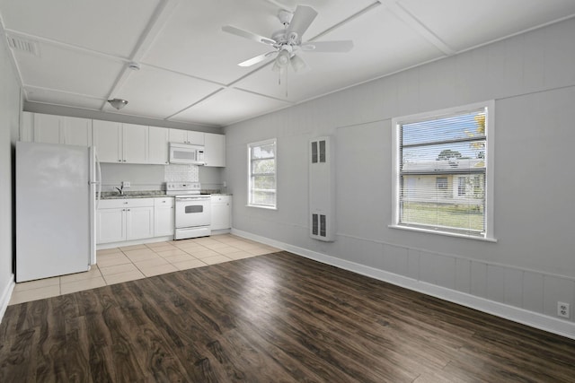 652 Bayberry Dr, Lake Park, FL 33403 - kitchen featuring a ceiling fan, white cabinetry, white appliances, visible vents, and light wood-style floors