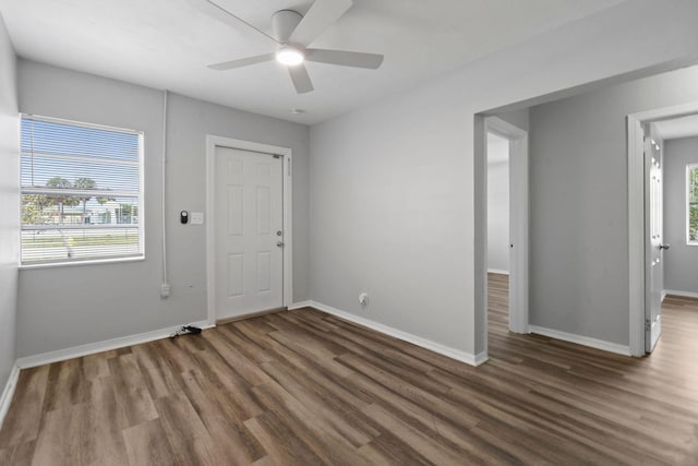 652 Bayberry Dr, Lake Park, FL 33403 - interior space featuring a ceiling fan, baseboards, and wood finished floors