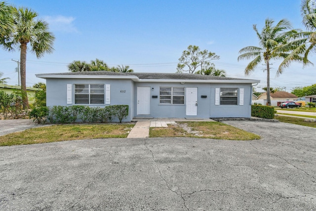 652 Bayberry Dr, Lake Park, FL 33403 - single story home featuring stucco siding