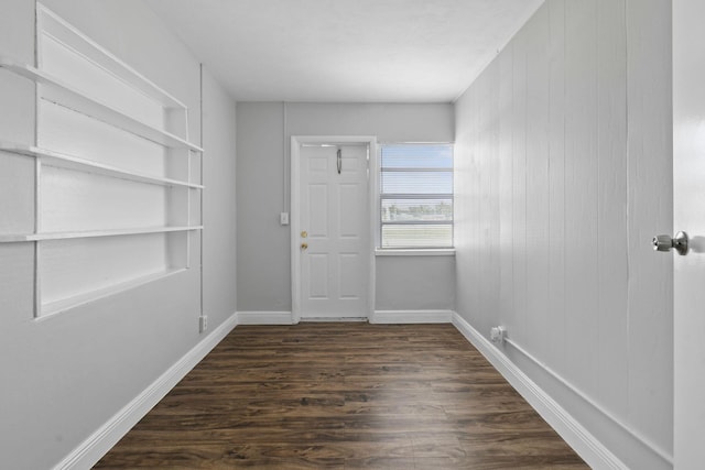 652 Bayberry Dr, Lake Park, FL 33403 - interior space with dark wood finished floors, baseboards, and built in features